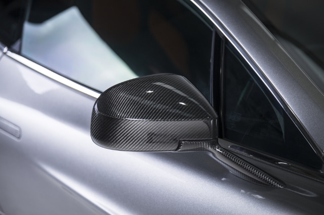 A closeup shot of a silver car with black side mirrors - perfect for background